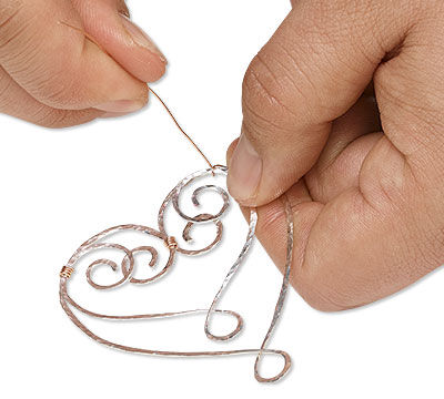 Wire wrapping shaped wire